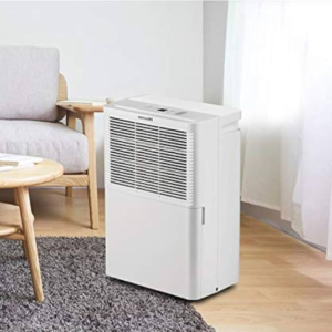 How does room temperature and humidity affect my dehumidifier's performance?